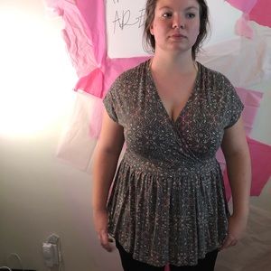 Super soft knit green top with pink accents